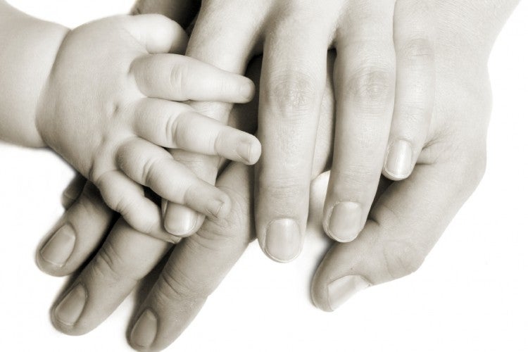 Mother and baby hands